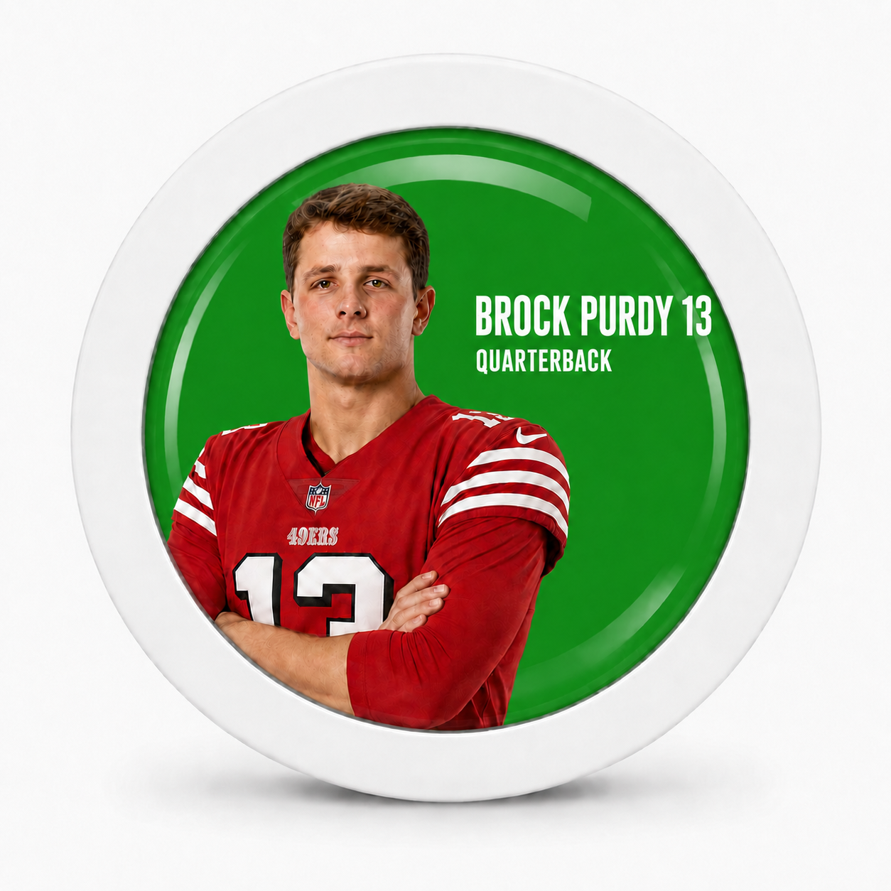 Rodela badge with Brock Purdy in a red 49ers jersey on a green background